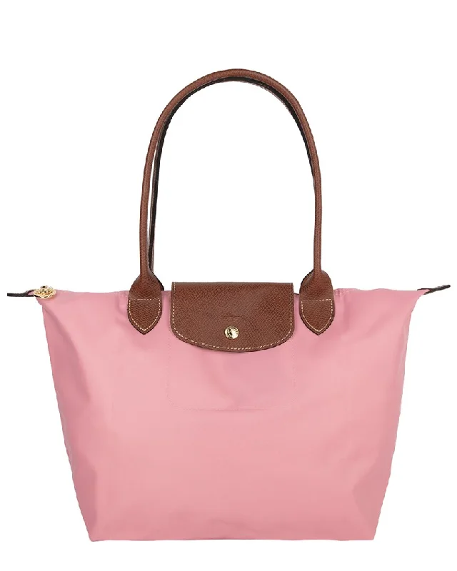 Handle bags with soft velvet for luxury -Handle bags with a crossbody option for versatility -Longchamp Le Pliage Original Tote