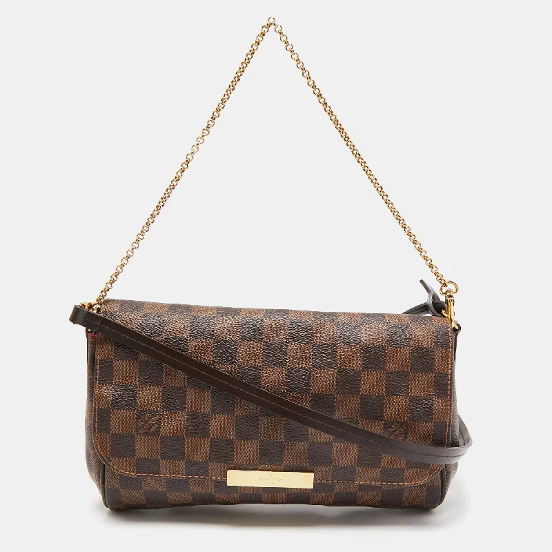 Handle bags with bright accents for pop -Trendy handle bags with animal-inspired textures -Louis Vuitton Damier Ebene Canvas Favorite Mm Bag