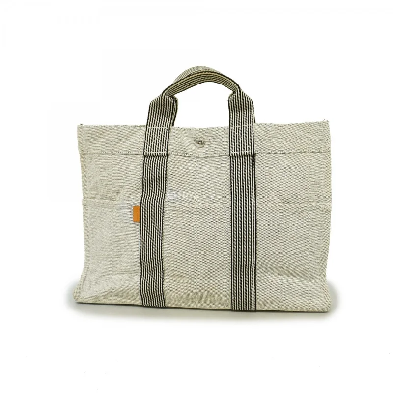 Handle bags with reinforced stitching for durability -Classic handle bags with timeless designs -Hermes  Canvas Tote Bag (Pre-Owned)