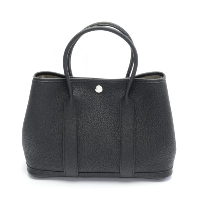 Handle bags with neutral leather for elegance -Handle bags with plush materials for a soft feel -Hermes  Negonda Leather Tote Bag (Pre-Owned)