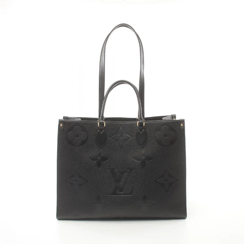 Handle bags with bright accents for pop -Trendy handle bags with animal-inspired textures -Louis Vuitton  Noir Monogram Empreinte Tote Bag (Pre-Owned)