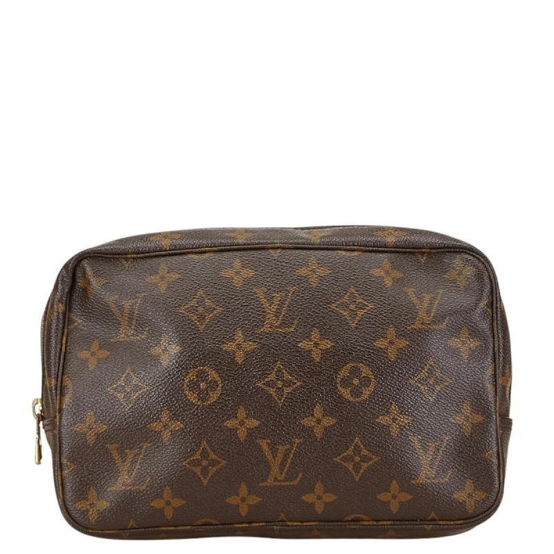 Handle bags with metallic finishes for shine -Handle bags with floral patterns for spring and summer -Louis Vuitton  Pvc Clutch Bag (Pre-Owned)