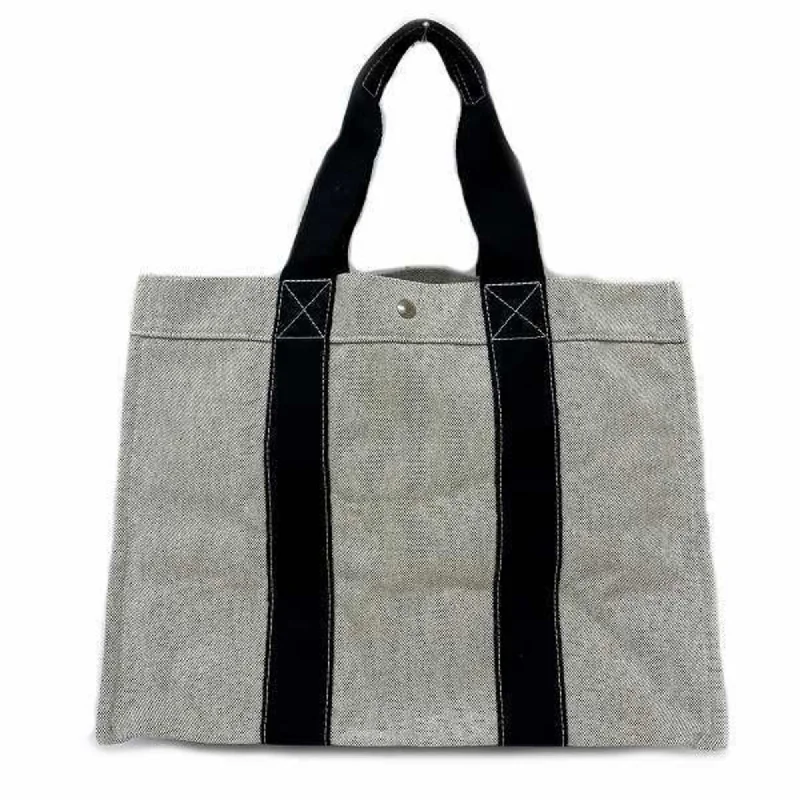 Handle bags with denim fabric for casual -Handle bags with a minimalist design for everyday use -Hermes   Canvas Tote Bag (Pre-Owned)