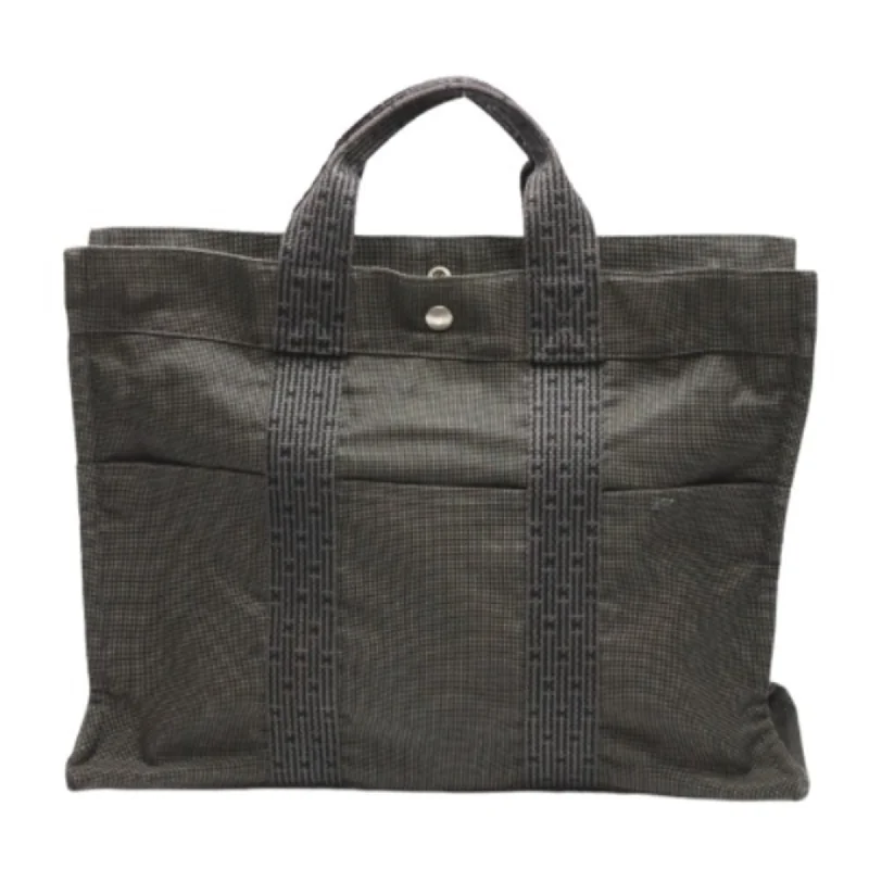 Handle bags with zipper tops for security -Sustainable handle bags made from eco-friendly materials -Hermes  Canvas Tote Bag (Pre-Owned)