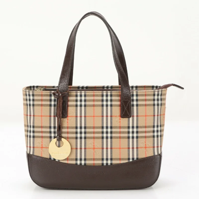 Handle bags with retro logos for charm -Handle bags with hidden pockets for extra security -Burberry  Leather Canvas Handbag Tote Bag (Pre-Owned)