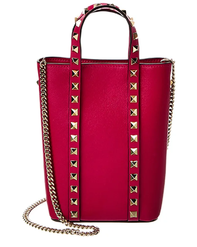 Handle bags with colorful handles for flair -Elegant handle bags for evening dinners -Valentino Rockstud Leather Tote