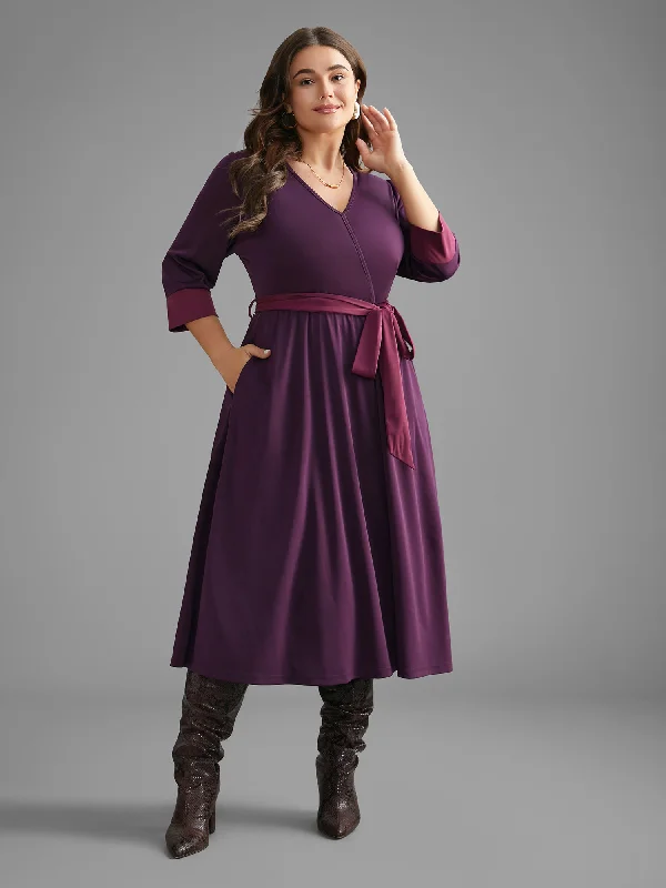 Plus size dresses featuring satin finishes feel smooth -Overlap Collar Contrast Belted Midi Dress