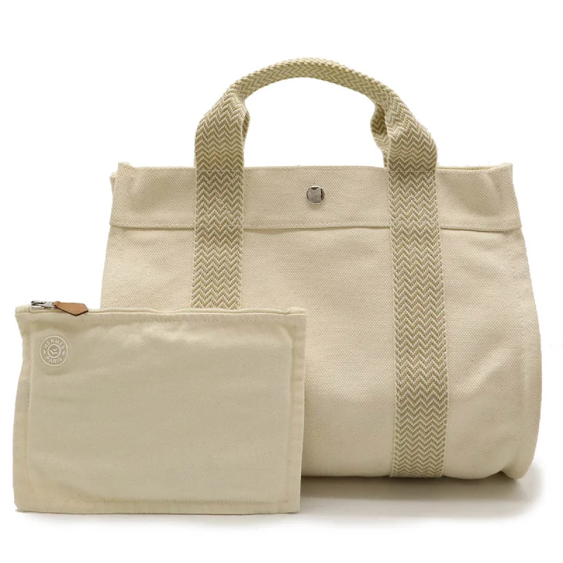 Handle bags with padded handles for comfort -Comfortable handle bags with ergonomic straps -Hermes  ivory Canvas Handbag Tote Bag (Pre-Owned)