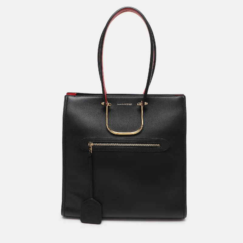 Handle bags with soft linings for protection -Handle bags with crossbody versatility for convenience -Alexander Mcqueen Black Leather The Tall Story Tote