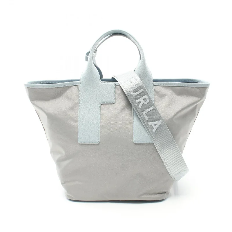 Handle bags with suede accents for texture -Casual handle bags for weekend outings -Furla blue  Leather Nylon Canvas Tote Bag