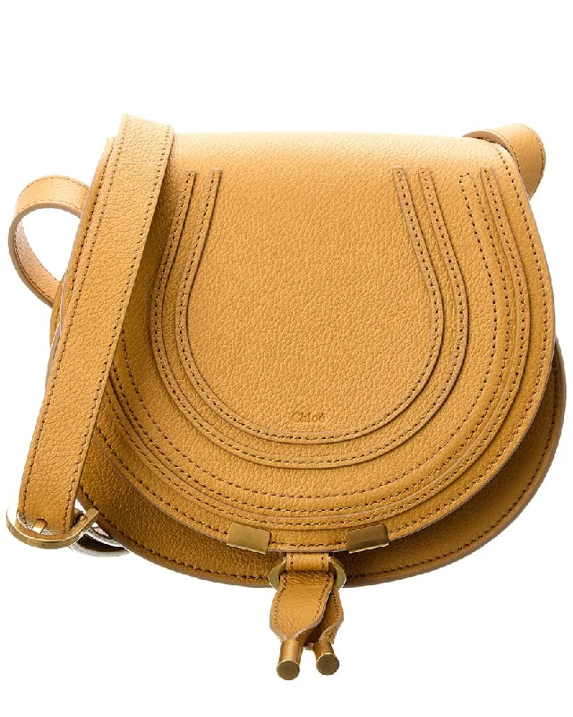 Handle bags with expandable sides for flexibility -Handle bags with decorative tassels for added detail -Chloé Marcie Small Leather Saddle Bag