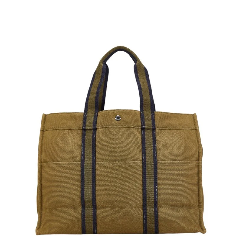 Handle bags with animal prints for flair -Structured handle bags for a sophisticated look -Hermes  Canvas Handbag Tote Bag (Pre-Owned)