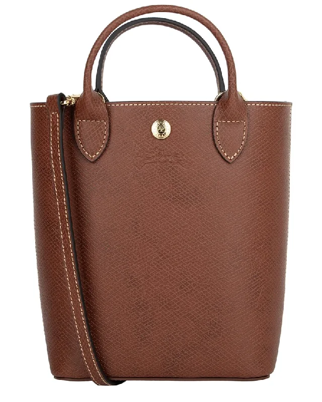 Handle bags with vintage clasps for nostalgia -Handle bags with fabric detailing for a casual yet chic look -Longchamp Epure Leather Tote