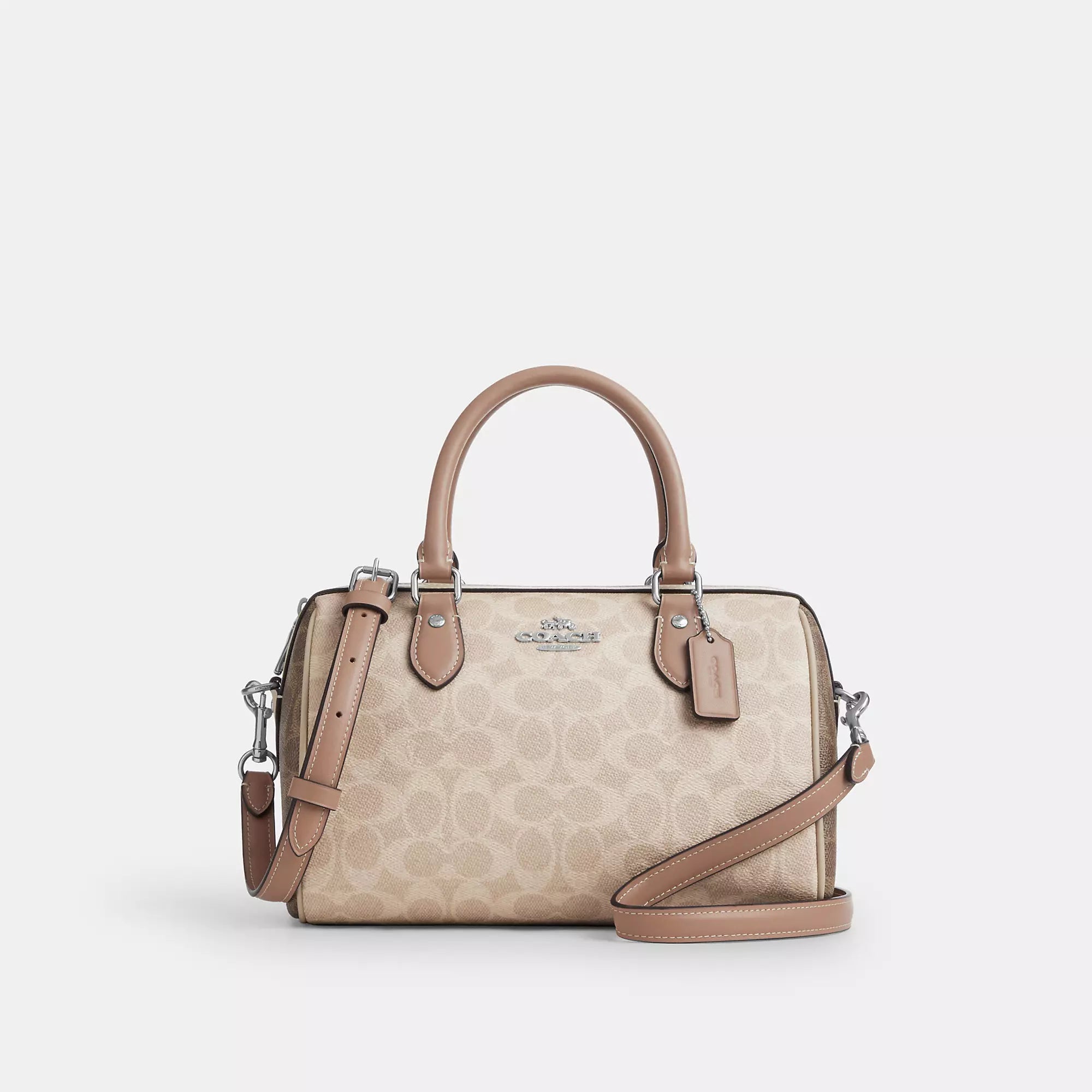 Handle bags with bold checks for trend -Handle bags with a bucket design for a trendy style -Coach Outlet Rowan Satchel Bag In Blocked Signature Canvas