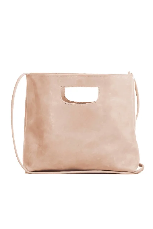 Handle bags with rustic leather for charm -Handle bags with braided straps for a unique touch -Hana Handbag In Pale Blush