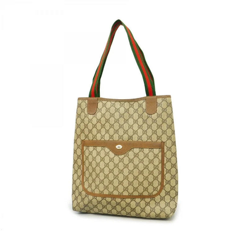 Handle bags with bold stripes for trendiness -Handle bags with multiple compartments for organization -Gucci  Pvc Tote Bag (Pre-Owned)