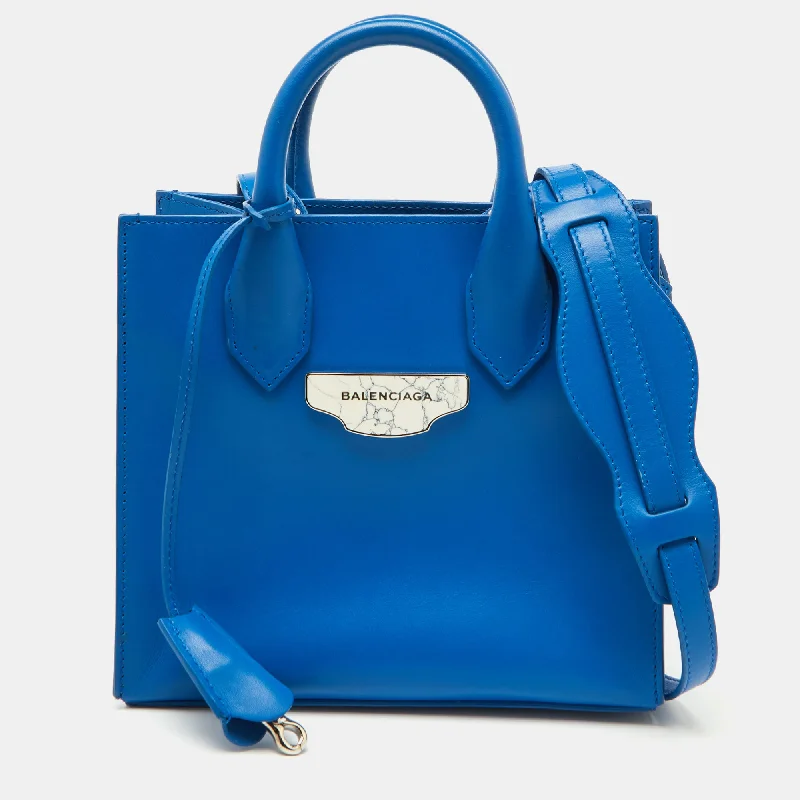 Handle bags with elegant gold-tone hardware -Handle bags with sleek silhouettes for a minimal style -Balenciaga Blue Leather Mini All Afternoon Tote