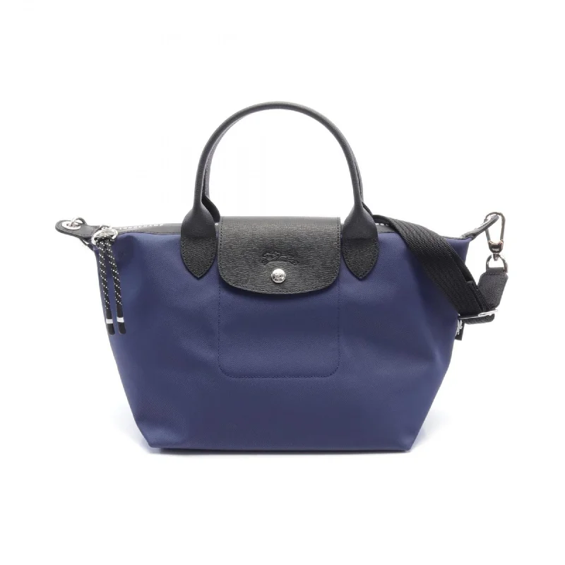 Handle bags with bright accents for pop -Trendy handle bags with animal-inspired textures -Longchamp  Navy Nylon Leather Tote Bag (Pre-Owned)