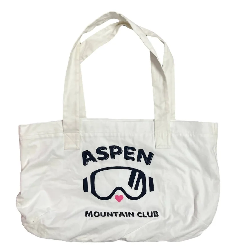 Handle bags with multi-color weaves for vibrancy -Handle bags with top closures for added security -Aspen Mountain Club Tote Bag In White