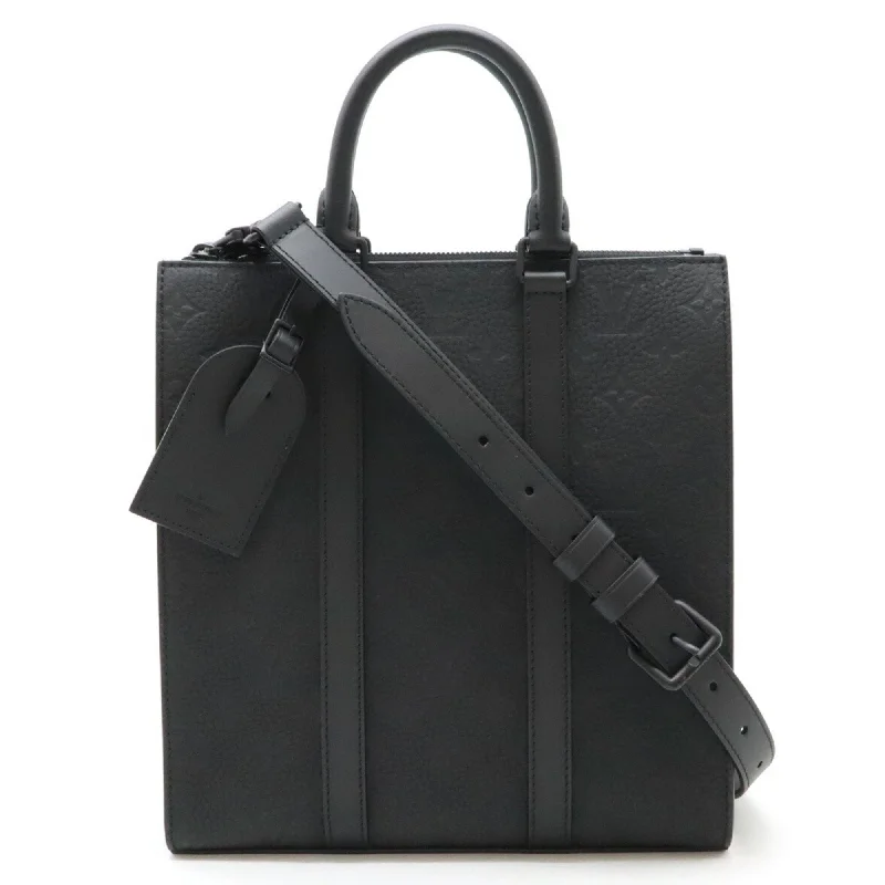 Handle bags with waterproof lining for protection -Handle bags with textured finishes for added flair -Louis Vuitton  Noir Leather Handbag Shoulder Bag Tote Bag (Pre-Owned)