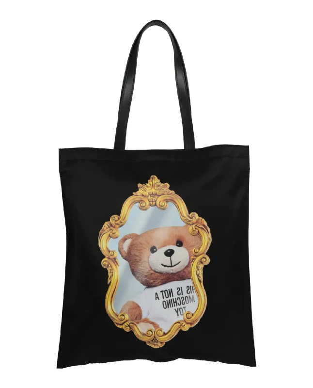 Handle bags with compact designs for portability -Handle bags with smooth, glossy finishes for high shine -Teddy Mirror Tote Bag