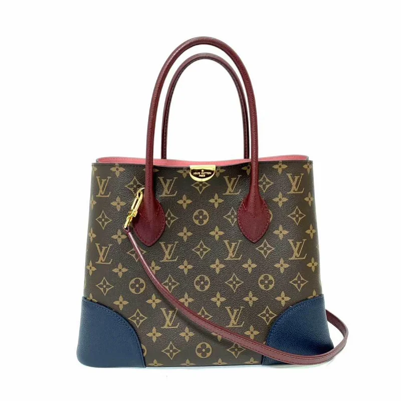 Handle bags with vibrant colors for boldness -Stylish handle bags for professional women -Louis Vuitton Monogram   Navy  Color Monogram Handbag Tote Bag (Pre-Owned)