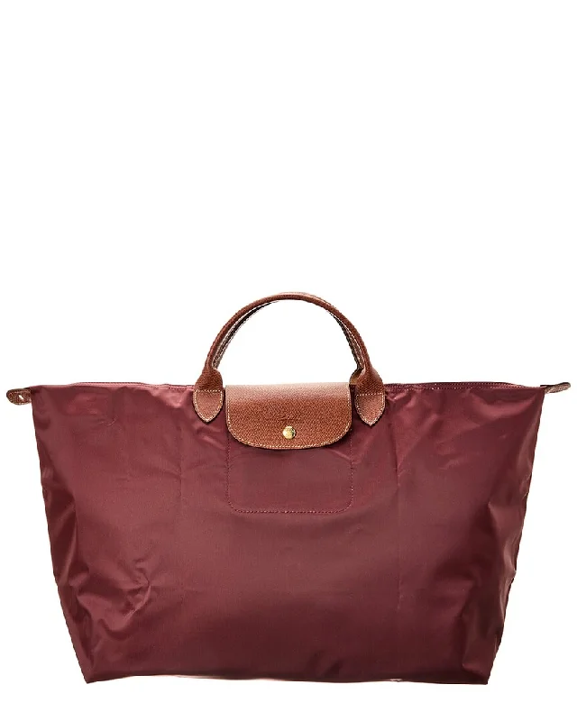 Handle bags with sleek silhouettes for fashion -Affordable handle bags for budget-conscious fashionistas -Longchamp Le Pliage Original Canvas Tote