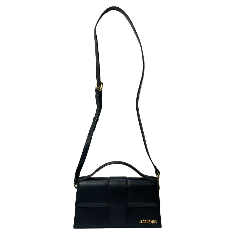 Handle bags with spacious interiors for storage -Handle bags with smooth leather for a sleek finish -Jacquemus Large Le Bambino Top Handle Bag in Black Leather