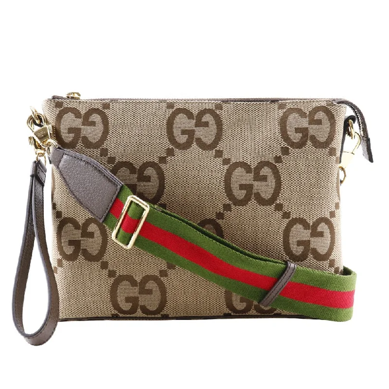 Handle bags with bohemian tassel embellishments -Handle bags with crossbody straps for convenience -Gucci Messenger  Canvas Shoulder Bag (Pre-Owned)