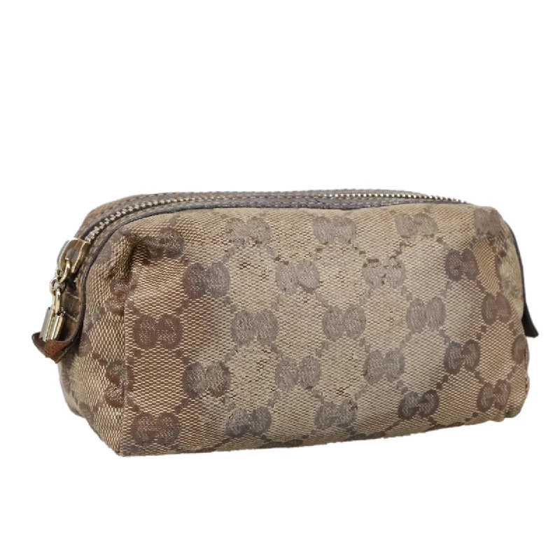 Handle bags with vintage vibes for nostalgia -Handle bags with contrasting colors for a modern look -Gucci Gg Crystal  Canvas Clutch Bag (Pre-Owned)