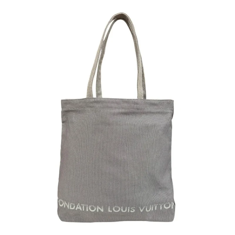 Handle bags with sleek leather for work -Handle bags with woven details for a beachy look -Louis Vuitton  Cotton Tote Bag