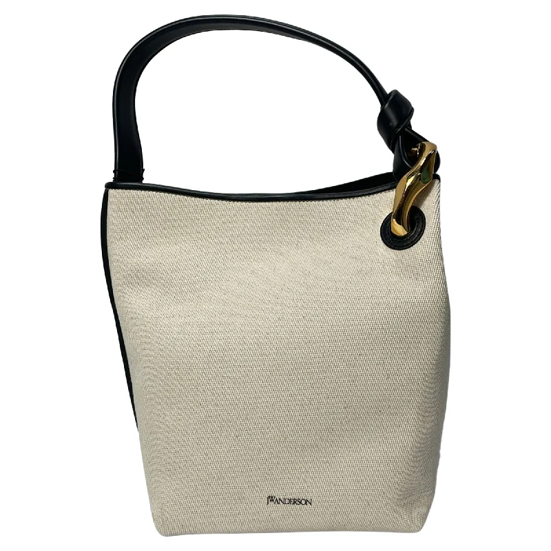 Handle bags with rugged canvas for outdoors -Handle bags with marble print for a unique design -JW Anderson Corner Bucket Bag in Cream Canvas