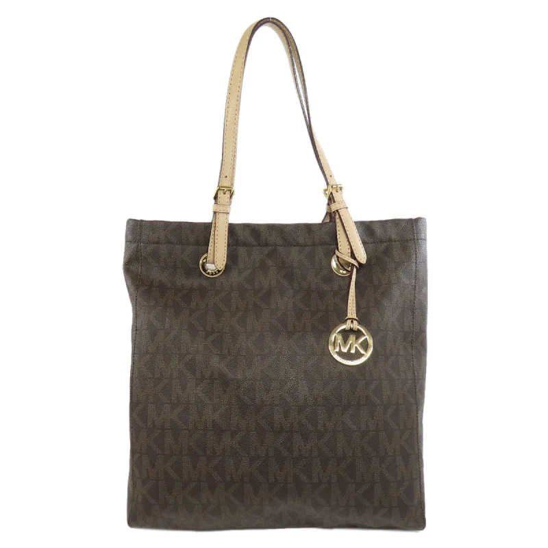 Handle bags with polka dots for fun -Luxury handle bags with embossed logos -Michael Michael Kors  Pvc Tote Bag (Pre-Owned)