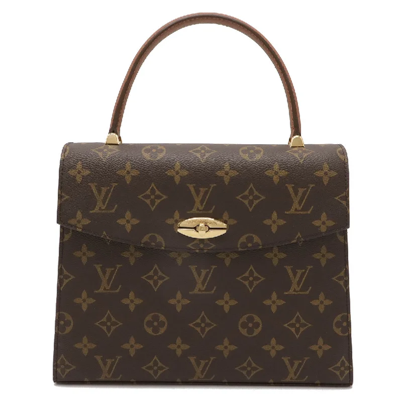 Handle bags with tropical leaves for summer -Handle bags with contrasting details for a dynamic look -Louis Vuitton Monogram Malletier Handbag M51379