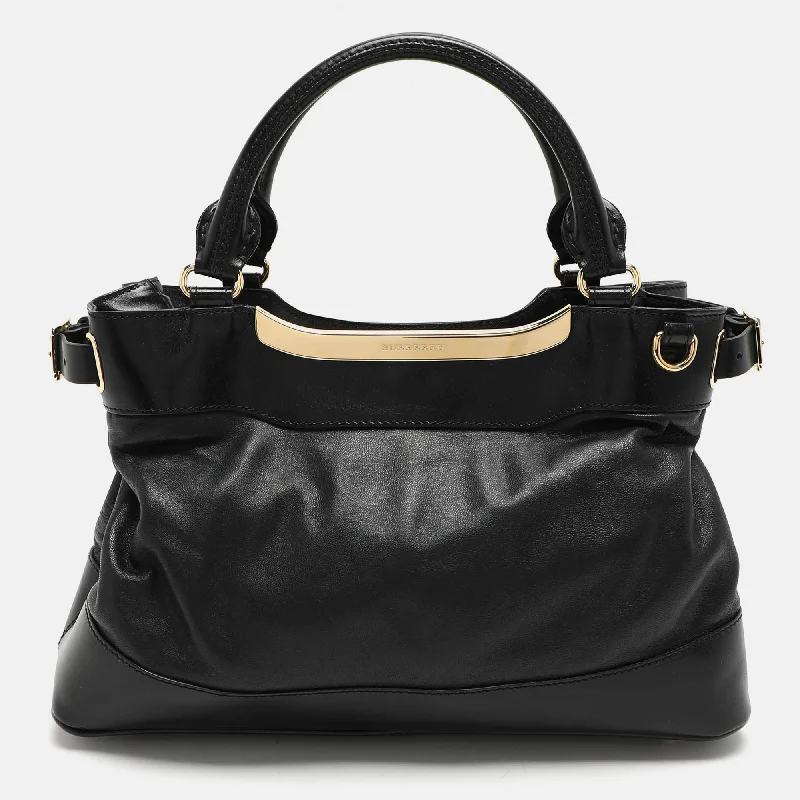 Handle bags with vintage vibes for nostalgia -Handle bags with contrasting colors for a modern look -Burberry Black Leather Bridle Hepburn Tote