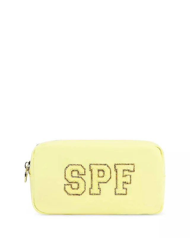 Handle bags with sleek hardware for sophistication -Small handle bags for a night out on the town -Classic Small Pouch In Banana Spf