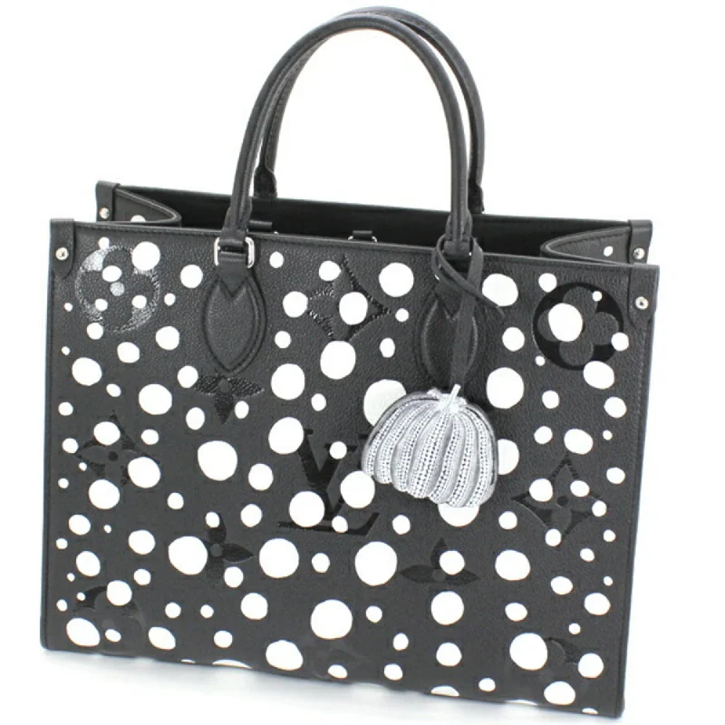 Handle bags with polka dots for fun -Luxury handle bags with embossed logos -Louis Vuitton Monogram Empreinte Tote Bag