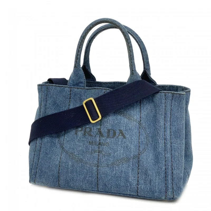 Handle bags with sturdy bases for stability -Handle bags with oversized designs for a statement piece -Prada  Canvas Tote Bag (Pre-Owned)