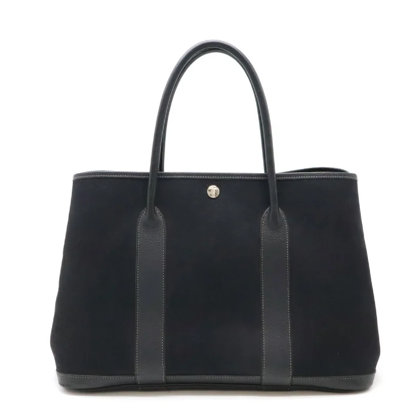 Handle bags with sleek black for elegance -Handle bags with studs for an edgy appearance -Hermes Garden  Toile Officier Leather Handbag Tote Bag (Pre-Owned)