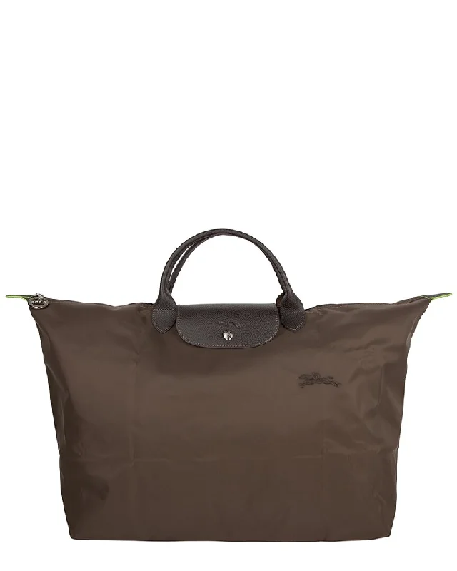 Handle bags with perforated details for style -Handle bags with leather detailing for a sophisticated touch -Longchamp Le Pliage Green Tote