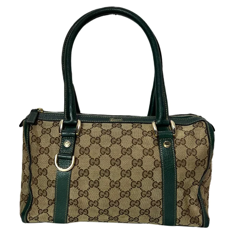 Handle bags with hidden pockets for security -Handle bags with flap closures for easy access -Gucci Small Abbey Boston GG Top Handle Bag in Brown Canvas