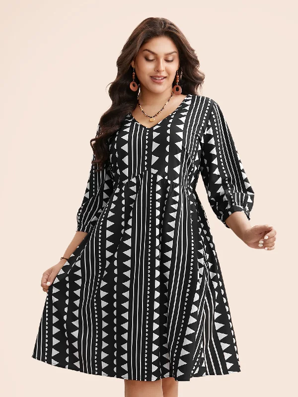 Plus size dresses featuring fringe accents feel bold -Geometric V Neck Lantern Sleeve Dress