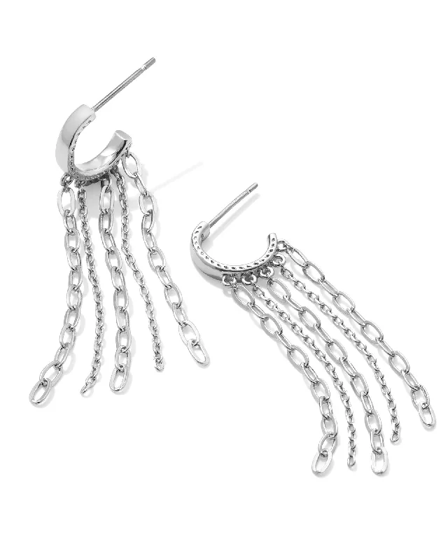 Hoop earrings with intricate designs for a unique and artistic appearance-Eve Huggie Earring in Silver Metal